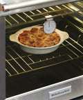 Dial Oven Thermometer With Rotating Clip And Stand For Precise 100F To 600F Temperature Readings in oven with baked goods