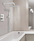 Modern bathroom with Brushed Nickel Shower System With 10 Inch Shower Head And Handheld, Includes Rough-In Valve And Trim Kit installed.
