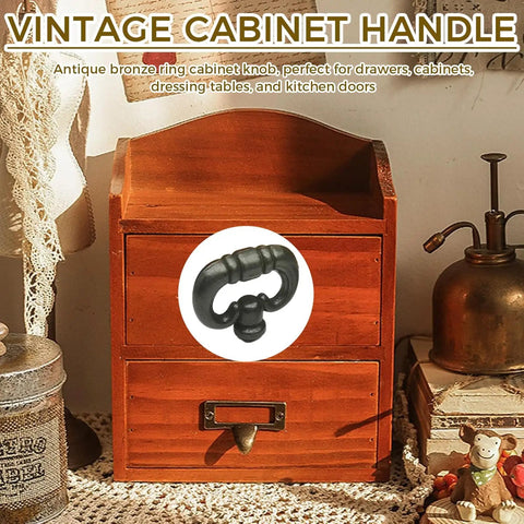 Solid As A Rock Matte Black Ring Knobs For Kitchen Cabinets And Bedroom Drawers Vintage Drop Design Furniture Pulls Hardware Bundle Comes With Screws For No Sweat Quick Install Upgrade on a wooden drawer.
