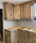 Rusted wood cabinets showing weathered brown and gray patina, made with Legit Rusted Aging Wood Stain Delivers Hella Authentic Weathered Brown And Gray Patina For Floors Cabinets Millwork Doors And Furniture With Voc Free Low Odor.