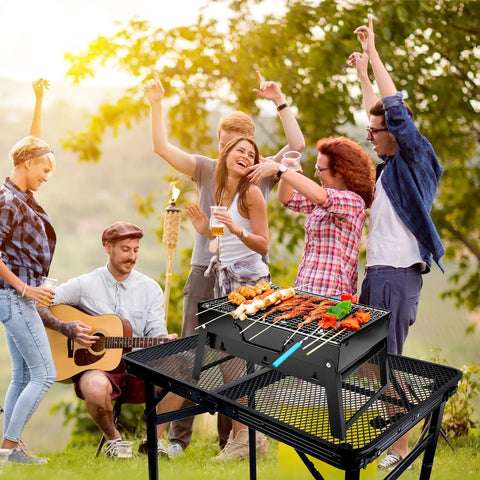 Foldable Camping Table With Adjustable Height, Portable Metal Picnic Table with grill, used by group at outdoor gathering.
