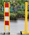 Built Tough And Ready To Roll Expanding Durable FRP Retractable Traffic Barrier in folded position, showcasing bright red and white panels.