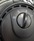 Close-up of control dial on 9420 20 Inch Industrial Grade Pedestal Fan For Heavy Duty Air Circulation In Workshops And Garages