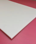Corner view of Six Pack 24x18 White Lawn Yard Signs Corrugated Plastic With Durable H Stakes Blank Promo Signs, showing texture.
