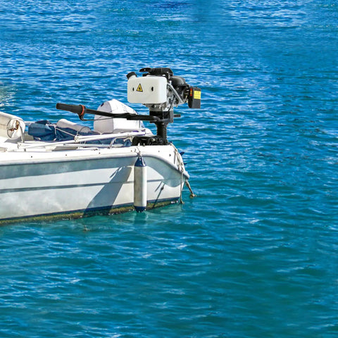 Powerful 4HP 55CC Outboard Motor with Short Shaft mounted on small boat in blue water