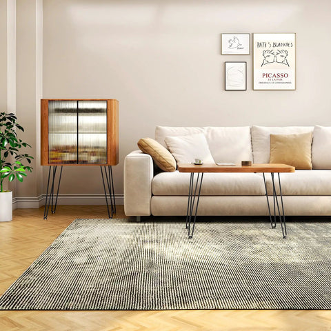 Living room with a sofa, coffee table, and cabinet using 22 Inch Hairpin Table Legs Set Of 4 Heavy Duty Black Metal Furniture Legs.