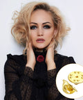 Gold Butterfly Clutch Pin Backs Replacement 10mm 50 Pack for Earrings and Jewelry Making next to woman wearing black top.