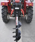 3 Point Post Hole Digger For Tractors With 6 Inch Auger Fits Compact And Sub Compact Cat 0 Tractors attached to red tractor