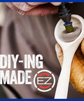Heavy Duty EZ Lock Sanding And Grinding Rotary Tool Accessories Kit With Eighteen Pieces for detail work on a wooden spoon.