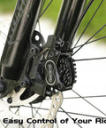 Front view of black DYISLAND hydraulic disc brake caliper mounted on a mountain bike fork with rotor