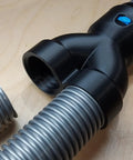 40mm Vacuum Hose Y Splitter Adapter with Swivel Fittings, shown splitting a hose into two ports for dust collection on tools