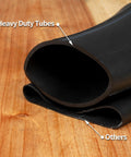 Heavy Duty Inner Tube 4.10/3.50-6 With TR-87 Angled Valve Stem on wooden surface, comparison with smaller tube labeled 'Others'. 
