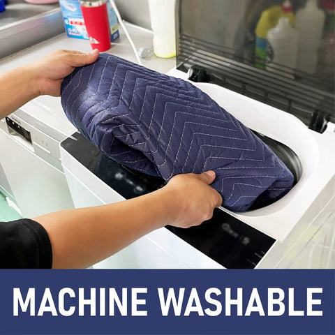 Person placing a 7-Pack Heavy Duty Padded Moving Blanket in a washing machine, demonstrating machine washable feature.