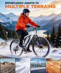 Person riding High Power 1000W Electric Mountain Bike For Adults With 26 Inch Frame on snowy trail, mountain background.