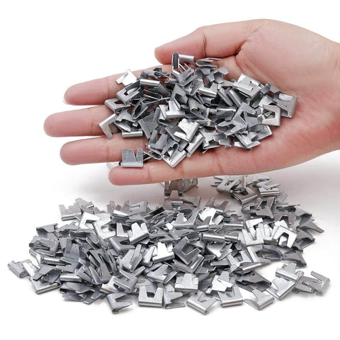 Person holding wire cage clips, part of the Wire Cage Clips With Hog Ring Pliers For Bird Quail Rabbit Chicken Coops Snap Ring Fencing Clips Kit.