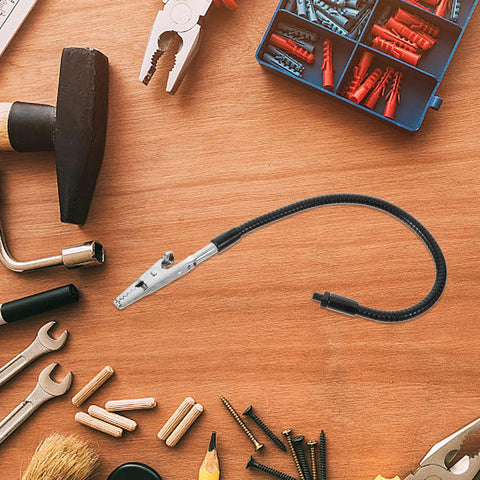 Alligator Clamp Welding Holder With Adjustable Flexible Arm And Magnifying Lamp Clip on workbench with tools and hardware