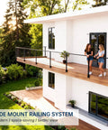 Slick Black Swageless Cable Railing Kit For Decks And Patios T316 Stainless Steel side mount setup with two women on a balcony.