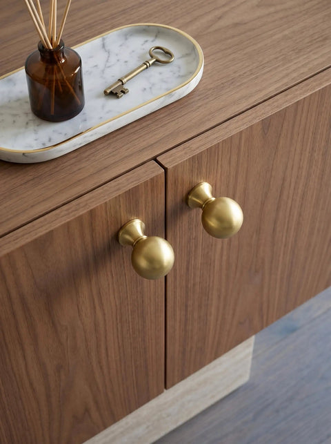 Top Shelf Brushed Gold Cabinet Knobs Six Pack For Modern Kitchen Drawers And Dressers Crafted From Solid Zinc Alloy Ridge Tough Construction Quick Install Mounting on wooden cabinet.