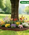 Lawn Edging Kit 100 Foot With 90 Spikes 2 Inch Tall Landscape Border Roll Brown used around a tree with colorful flowers