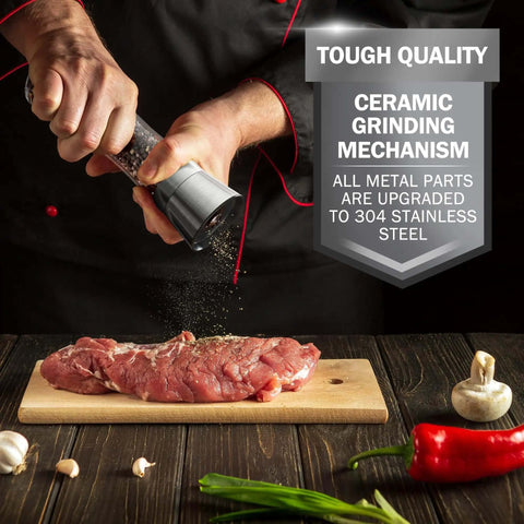 Stainless Steel Salt And Pepper Grinder Set Of 2 With Adjustable Ceramic Mills used on steak, emphasizing ceramic grinding mechanism