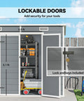 No Nonsense 8x4 Outdoor Storage Shed Made Of Waterproof Resin Plastic with lockable doors and floor, showing interior storage