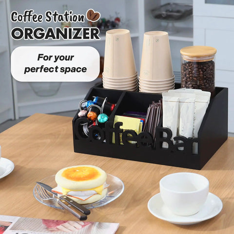 All In One Coffee Bar Organizer For Countertop Wooden Station Caddy With Tray For Pods Cups Condiments And Accessories Kitchen Or Office Counter Storage Medium Size Black Finish on kitchen table, displaying coffee pods and cups.