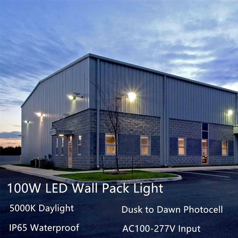 Ultra Bright 100W LED Wall Pack Dusk To Dawn Outdoor Security Lighting 13000 Lumens illuminating exterior building at dusk