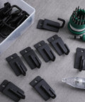 25 Pack J Shaped Slatwall Hooks And Hangers Heavy Duty Slatwall Accessories For Garage And Shop Display Panels 3.25 Inch Black Great For Retail Displays And Garage Organization With Durable Build And Easy On Demand Use shown on concrete surface with tools