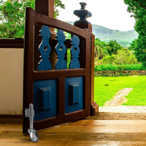 Gate with heavy duty gate support caster wheel with spring shock absorption system for yard gates, 3 inch plate caster visible