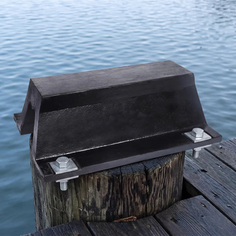 Arch Rubber Dock Shield for Dock Protection From Boat Impacts mounted on wooden dock with bolts, marine rubber, waterside view