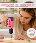 Pink 8V USB Rechargeable Power Drill Driver Kit For Women cordless drill used by a woman, with bit set visible on the table.