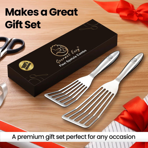 Two-piece stainless steel fish spatula set with slotted heads (large and small) displayed beside a black gift box.