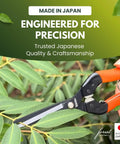 Top Notch Pro Grade Japanese Harvesting Shears With Straight 58 Millimeter Blade Black Fluorine Coated Stainless Steel in hand.