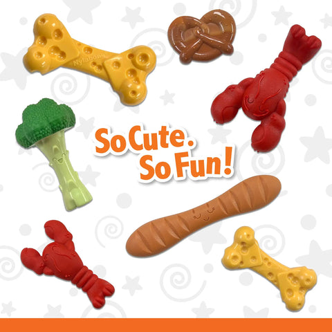 Lobster Shaped Power Chew Dog Toy For Pups And Small Dogs With Triple Chew Ends And Easy Grip Arch Durable For Aggressive Chewers Great For Chewing Teething And Mental Stimulation. Assorted nylon dog toys on white background