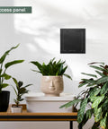 Solid Heavy Duty 6X6 Inch Anthracite Abs Plastic Drywall Access Panel that handles ceiling or wall electrical plumbing and hvac jobs with zero hassle and a sweet snap fit install, mounted on wall near plants.