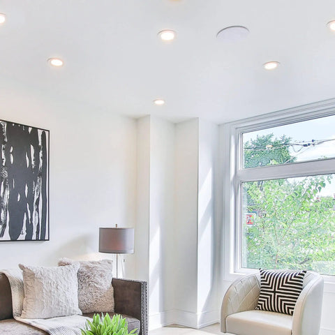 Living room with Six Pack 5 Inch LED Recessed Ceiling Lights Sleek Ultra Thin Canless Downlight With 3CCT Selectable
