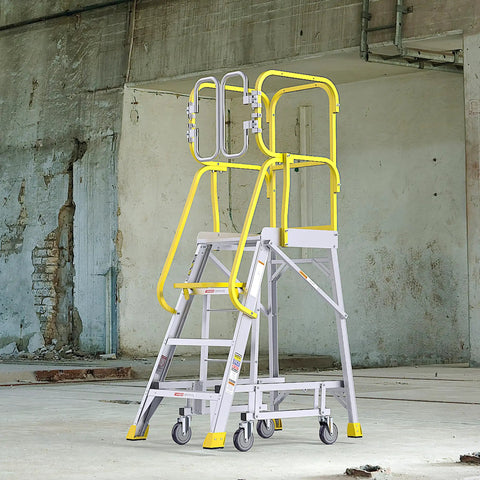 Top Shelf Heavy Duty Aluminum Rolling Platform Ladder With Smooth Glide Casters And Reinforced Safety Rails 375 Lb Capacity in industrial setting.