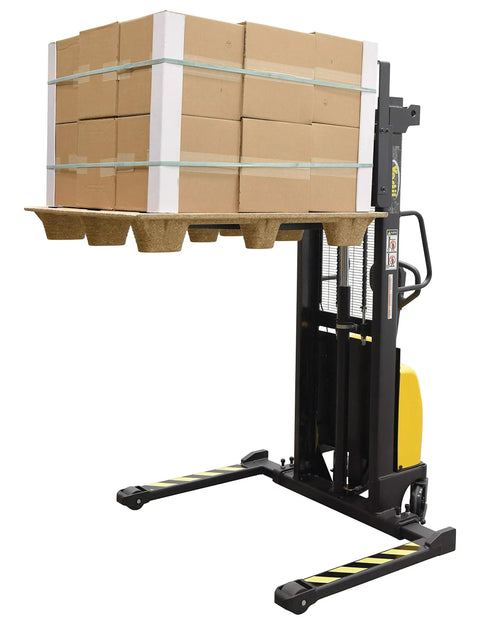 Rock Solid DC Powered Electric Pallet Stacker With Adjustable Forks And Leveling Legs Reaches Sixty Three Inch Lift Height Handles Two Thousand Pounds Smoothly Makes Heavy Loads Feel Light For Zero Stress Shop Jobs lifting stacked boxes on a pallet.