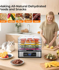 Heavy Duty Five Tray Food Dehydrator With Adjustable Temp Control And Auto Timer for drying fruits, veggies, and herbs in a kitchen setting.