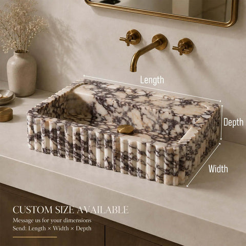 Calacatta Viola Marble Apron Sink, Hand-Carved Fluted Bathroom Washbasin, rectangular natural stone basin on countertop.