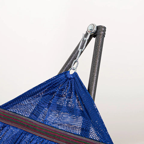Close-up of navy hammock on steel stand, part of Heavy Duty Outdoor Hammock With Collapsible Steel Stand And Carrying Case, On The Go And Adjustable, Holds Up To 450 Lb Capacity, Navy Foldable Hammock Set For Camping Beach Patio.