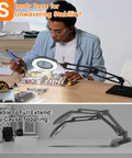 Man using 10X Magnifying Glass With Light And Stand, 84 LEDs, 2 In 1 Magnifier Lamp With Clamp for electronics work.