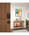 Keyless Front Door Lock With Touchscreen Keypad In Aged Bronze, installed on wooden door, living room view