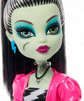 Fresh Frankie Stein Reproduction Doll From The Iconic Dawn Of The Dance Lineup featuring side view, sleek black and white dress, pink shrug.
