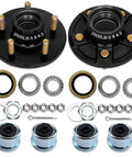 Two black 3500lb 5-lug trailer hubs with 4.5 inch bore; includes bearings, seals, nuts, cotter pins (Amazon)