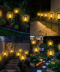 7 Pack Solar Torch Lights With Flickering Flame For Realistic Look, Large Size Garden Decor for pathways and yards at night.