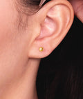 Real 14K Gold Ball Screw Back Stud Earrings For Women And Men 4mm Solid Yellow Gold Hypoallergenic And Hand Polished For Everyday Comfort And All Day Wear on ear
