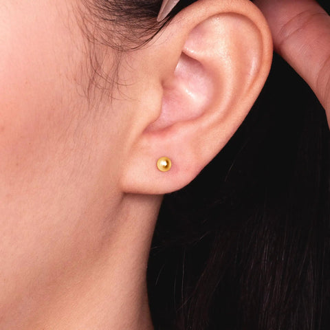 Real 14K Gold Ball Screw Back Stud Earrings For Women And Men 4mm Solid Yellow Gold Hypoallergenic And Hand Polished For Everyday Comfort And All Day Wear on ear