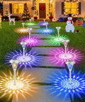 8 Pack Solar Pathway Lights With Auto Sensor Color Changing White To Multicolor Glass Stainless Steel Outdoor Landscape Lighting illuminating a festive yard