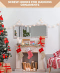 Christmas living room with tree and gifts, using Gold Cup Hooks Set With 110 Pieces In Six Sizes One Half Inch for decoration.